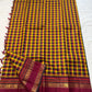 Manjal Maroon Kattam – Pure Kanchipuram Silk Saree
Mustard & Maroon Body with Traditional Multi-Color Checks
Korvai Borders with Floral-Star Zari & Temple Tips
Grand Maroon Pallu with Gold Zari Stripes & Tassels
Silk Mark Certified | ships in 2 weeks