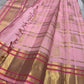 Close-up of blush pink Kanchipuram silk saree with allover gold zari checks and intricate pink-gold borders – Idam Living