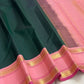 Draped view of Adar pachai green Kanchipuram silk saree highlighting thamarai pink rettapet border, shipped from New Jersey USA