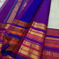 Kumari ✨ – Pastel Sage Green Kanchipuram Pure Silk Saree
with Delicate Golden Floral Buttas 🌸
Purple–Red Korvai Varisaipet Zari Border
Grand Purple Pallu with Stripes & Floral Vines
An Heirloom of Grace, Heritage & Festive Splendor