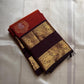 The Rust Orange Abharna: A Silk Mark Certified Kanchipuram Pure Silk Saree
with Maroon and Gold Elephant Zari Border & Rich Zari Pallu
Handwoven with Exquisite Peacock Motifs
Free Shipping within USA on this Handloom Creation
Ships in 1 Week