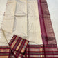 Ivory Arakku Varisaipet Trellis ✨
Pure Kanchipuram Silk with gold buttas & maroon korvai borders
Silk Mark Certified • Free USA Shipping • Ships in Two Weeks ✅