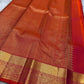 Agnika – Tomato orange shot Red Kanchipuram Silk Saree with Mayil Chakram Butta & Orange Border
Fiery and regal, Agnika is a pure Kanchipuram silk saree featuring a rich red body adorned with intricate Mayil Chakram buttas.