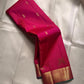 Rani Kili Butta Vairaoosi — Pure Silk Kanchipuram Saree
Rani-pink body with zari buttas & twin parrot motifs, antique-gold coin borders with emerald selvedge
Rich red-orange vairaoosi pallu with rosette brocade, matching blouse included
Silk Mark Cert