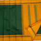 Maragatham & Mustard — Pure Silk Kanchipuram Saree
Emerald-green body with mustard korvai borders & floral medallion vines, varisaipettu pallu with tassels.
Silk Mark Certified • Ships in Two Weeks • Free USA Shipping ✅