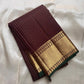 Kapi Ratna Kattam
Coffee-Deep Brown Zari Grid Saree
Pure Kanchipuram Handloom • Temple Gold Borders