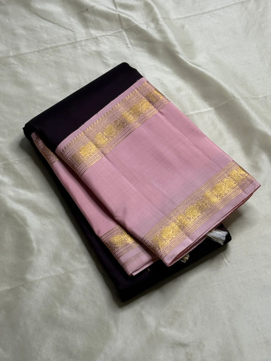 Rose Twilight – Pure Kanchipuram Silk Saree
Pastel Rose-Pink border with Golden Zari Weaves
Deep Plum-Violet Base Scattered with Gold Buttas
French Rose Rettapet Border in Lustrous Zari

Silk Mark Certified, delivery in 2 weeks