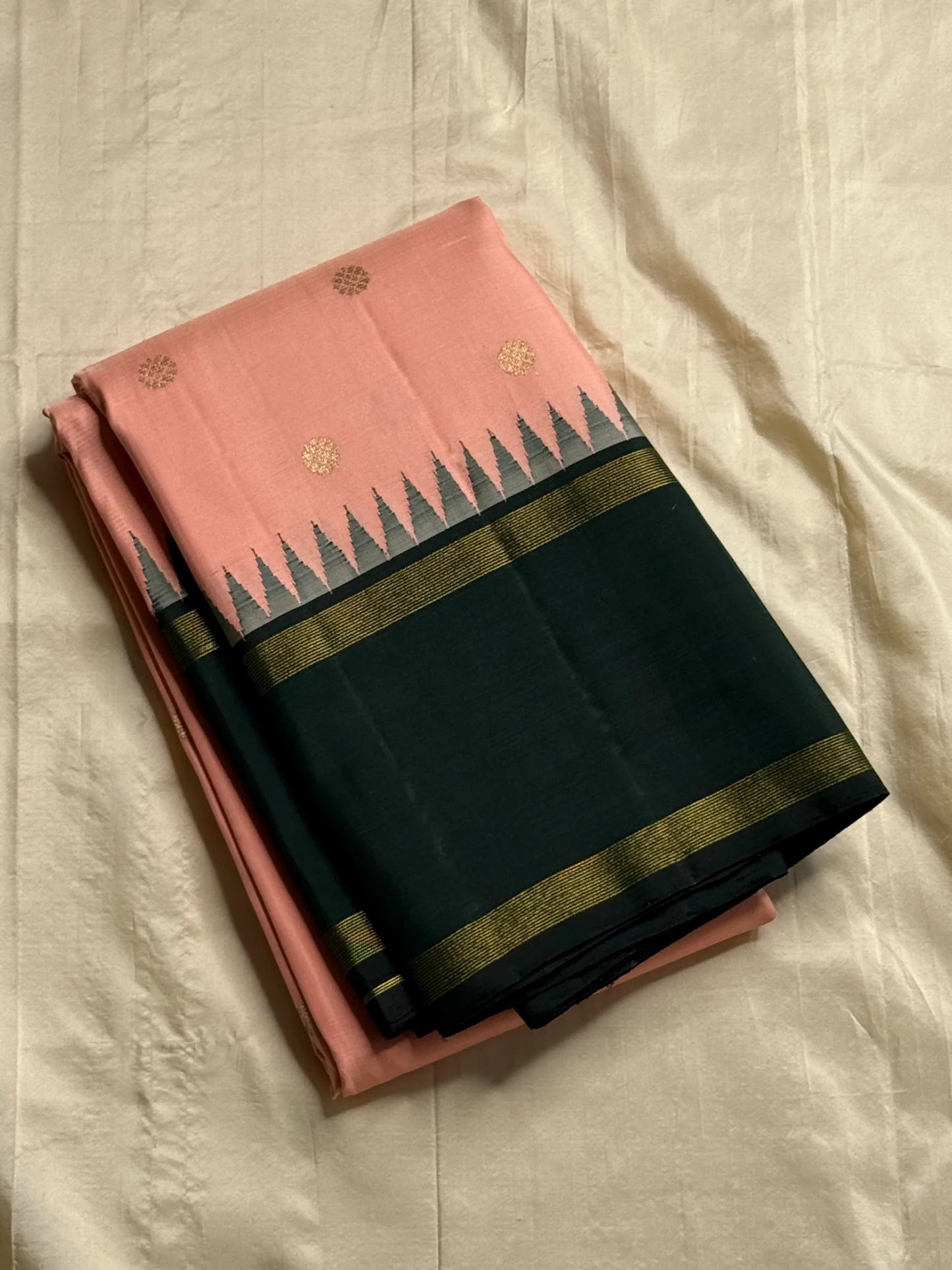 Peach Pastel Pink Pillayar Moggu green korvai Kanchipuram Pure Silk


Soft peach-pink body with delicate gold pillayar moggu & buttas

Contrast deep green pallu with rich zari stripes & coin buttas 

Silk mark , free shipping (USA)  two weeks