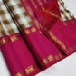 Ivory & Caramel beige Checked Pure Silk Saree

Rani-Pink Rettapet Border with Gold Zari Coin Roundels

Rich Rani-Pink Zari Pallu with Chevron & Stripe Weave

Pink Blouse Piece with Matching Zari Border
silk Mark certified , 2g Zari korvai Kanchipuram