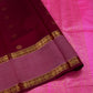 Cherry Red Silk Cotton Saree  
Raspberry Pink Rettapet Border  
Pavun Coin Butta All Over  
Grand Floral & Rudraksham Pallu