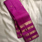 vasantham  Fuchsia pink – Handwoven Kanchipuram Silk Saree A poem in Fuchsia silk. The body glows in a serene vibrant Fuchsia, softly accented by delicate gold vertical lines and dainty gold zari buttas that glint like little blessings.