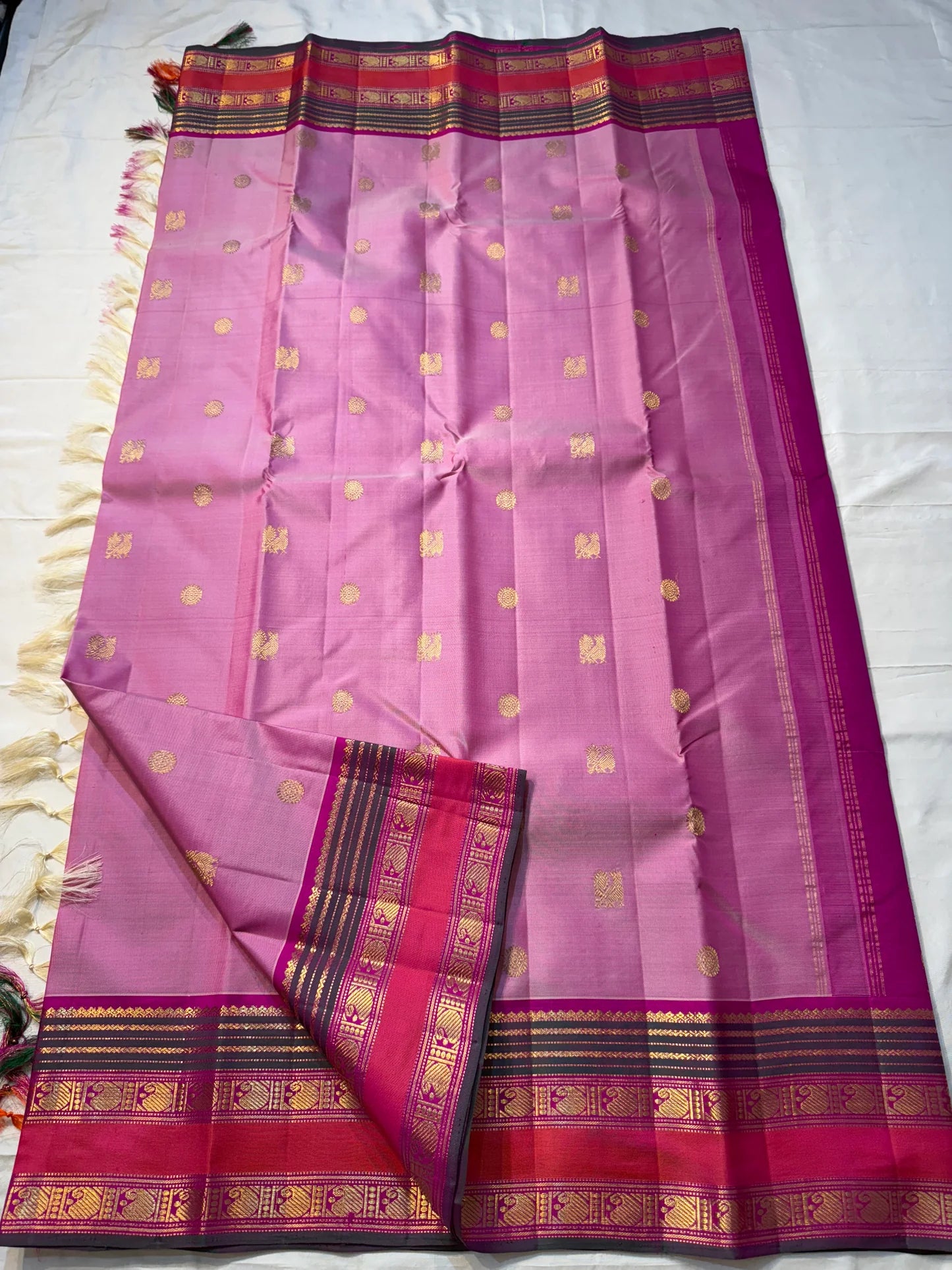 Pink Ombre Kanchipuram Pure Silk

Fuchsia Korvai Border • Charcoal stripes

Gold Zari Buttas (chakram & mango)

Rich zAri Pallu • Blouse included

Silk Mark Certified • Free USA Shipping • Ships in Two Weeks

— Pink Ombre Butta Korvai