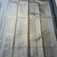 Chamomile — Kanchipuram Pure Silk

Pale gray-blue body with silver roopa buttas all over

Temple gopuram-inspired zari borders in luminous silver

Rich silver brocade pallu with intricate detailing

Silk Mark Certified • Free Shipping within USA