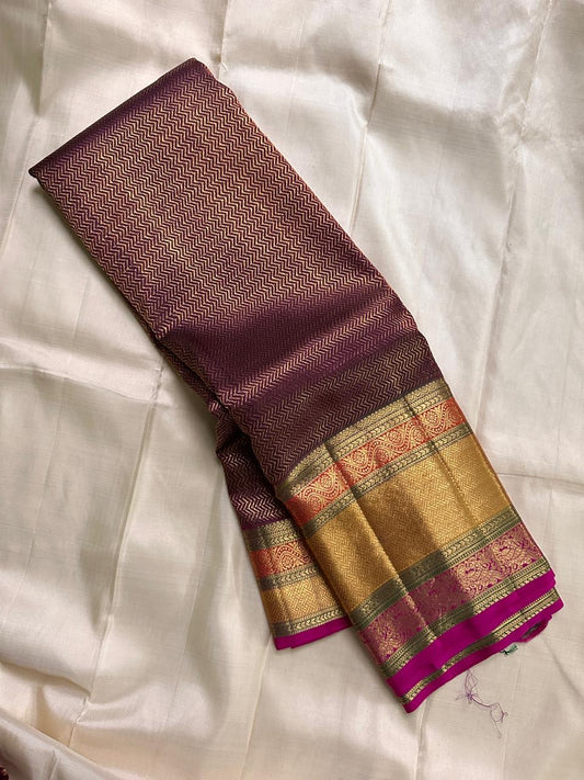 Kanchipuram pure silk chocolate, brown Zari chevrons with magenta varisaipet border