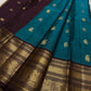 Neeli Megham – Pure Silk Kanchipuram
Teal-blue body with gold annapakshi buttas & aubergine korvai border in antique zari brocade
Silk Mark Certified • Fall & Pico Done • Blouse Stitching Available ($30) • Free Shipping within USA • Ships in Two Weeks