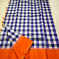 Lilac Indigo Kattam — Pure Silk Kanchipuram Saree
Bold indigo–lilac–white checks with tangerine korvai borders & gold temple edging
Silk Mark Certified • Free USA Shipping • Ships in Two Weeks