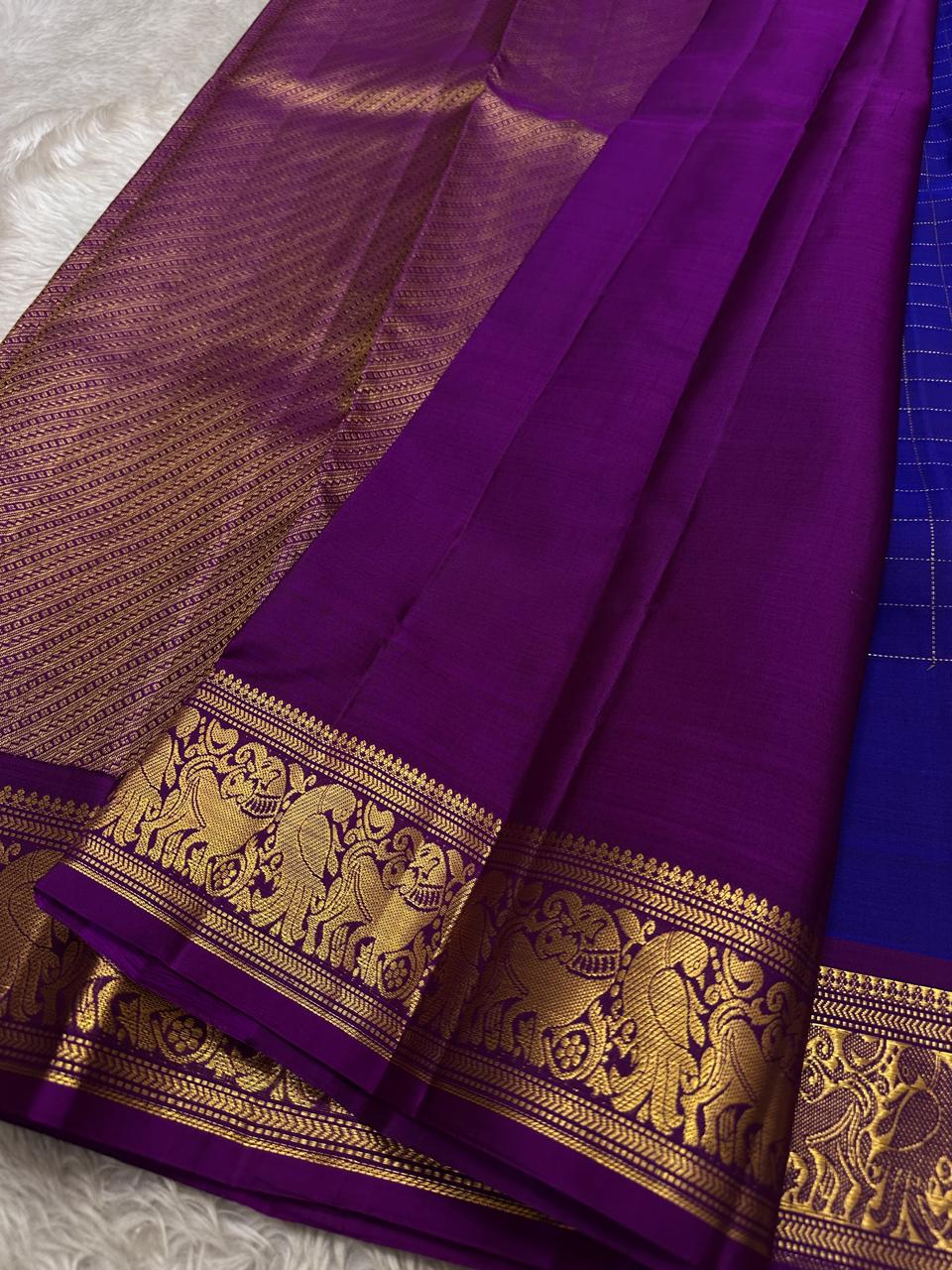 Sorgavaasal Kili , stunning motif in  MS blue and purple zari kattam zari woven yazhi buttas in pure silk kanchipuram