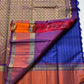 Indra Neelam Kattam – Pure Kanchipuram Silk Saree
Royal Blue Body with Fine Zari Grid Checks
Copper-Rose Korvai Borders with Floral & Chevron Zari
Grand Purple Pallu with Tassels
Silk Mark Certified | ships in 2  weeks | Blouse Stitching Available