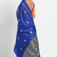 Close-up of the tiny red accents within the silver-toned woven motifs on a Royal Blue Chanderi saree