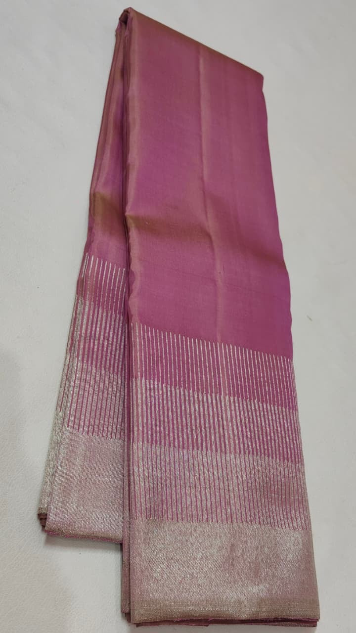 Delicate pink pure Kanchipuram silk saree with classic gold zari border woven in ettukol technique