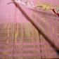 Detailed gold zari elephant and peacock motifs on the blush pink Varisaipet self border