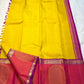 Mangai Manjal Chakram — Kanchipuram Pure Silk

Sun-yellow body with tiny zari buttas • Korvai contrast border

Rani-pink shot with purple selvedge • chakram medallions

Vaira-oosi diamond pallu with dual-tone tassels

Silk Mark Certified • Free shipping