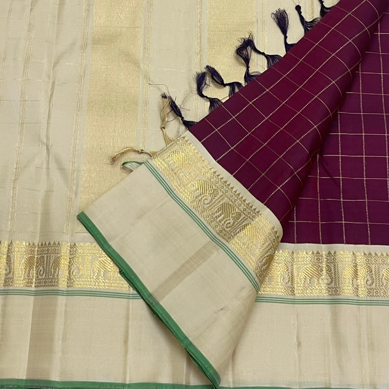 Kanchana Checks — Pure Kanchipuram Silk
Jamuni Gold Grid × Ivory border  with Gaja Zari
Ivory Zari Pallu • Contrast Jamuni Blouse
Silk Mark Certified • Free Shipping within USA
Dispatch in 1 Week • Ships in Two Weeks