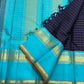 Indigo Teal Kattam – Pure Silk Kanchipuram Saree
Deep Indigo Body with zari Kattam Checks
Teal Contrast Korvai Border with maanga pet and mayil kann border, maanthulir selvedge  , silk mark certified -ships in two weeks