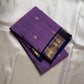 Lilac Mayil Pushpam – lilac-purple body with navy korvai borders

Pure Kanchipuram silk • gold zari pushpam (flower) buttas all over

Grand navy brocade pallu with diamond jaal • contrast blouse with border

Silk Mark Certified | Fall & Pico Done |