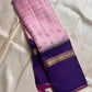 Anaar ✨ – Royal Purple & Lotus Pink Kanchipuram Pure Silk Saree
With Zari Kattam Checks, Mayil Motif Border & Grand Pallu
Korvai Contrast Weave in Regal Purple , 
Peacock & Floral Zari Panels, Raspberry Selvedge Finish
Silk Mark Certified