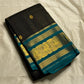 Karuppu Pakshi Kattam – Pure Korvai Kanchipuram Silk Saree
Charcoal black podi kattam body with coin-gold buttas
Peacock-teal korvai border & pallu with pakshi medallion zari
Silk Mark Certified | Blouse Piece Included | Fall & Pico Done
Free Shipping