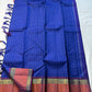Indra Neelam Kattam – Pure Kanchipuram Silk Saree
Royal Blue Body with Fine Zari Grid Checks
Copper-Rose Korvai Borders with Floral & Chevron Zari
Grand Purple Pallu with Tassels
Silk Mark Certified | ships in 2  weeks | Blouse Stitching Available