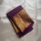 Aubergine Amber Kattam – Pure Kanchipuram Silk Saree
Deep Aubergine Purple Body with Gold Kattam Checks
Grand Zari Borders with Majestic Peacock Motifs
Contrast Amber-Orange Pallu with Rich Zari Detailing
Silk Mark Certified | ships in two weeks
