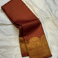 Rust Orange Elephant Peacock Arches – Pure Silk Kanchipuram Saree
Tiny gold podi butta motifs with grand elephant & peacock arch borders
Rich antique-gold zari pallu with floral columns & temple designs
Silk Mark Certified | Free Shipping within USA-