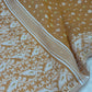 Wide border panel of Jamdani saree with repeating ivory woven pattern