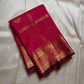 Charita – Tomato Red Kanchipuram Silk Saree
With Bold Zari Kattam Checks & Floral Motifs
Featuring Arai Maadam Border & Rettapet border