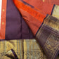 Rust Orange Kattam & Purple Korvai – Pure Kanchipuram Silk Saree

Rust-orange checks with delicate gold buttas and contrast purple korvai borders

Grand purple zari-pallu | Contrast purple blouse | Fall & Pico Done

Silk mark certified ships