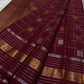 Pankajam 🌺 – Brown maroon Kanchipuram Silk Saree with Zari Kattam, Dashed Lines, Kolam Motifs, Varisaipet Border with Thandavalam Zari Stripes, Rudrakshpet, Annam & Kamalam Motifs, Deep Brown Selvedge & Ornate Pallu