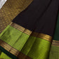 Pachai Maragatham — Pure Kanchipuram Silk Saree
Deep pachai (forest green) body with gold chakram buttas and maragatham chevron zari borders, finished with a coffee-brown brocade pallu.
Silk Mark Certified • Blouse Stitching Available ($30) • Free Shippin