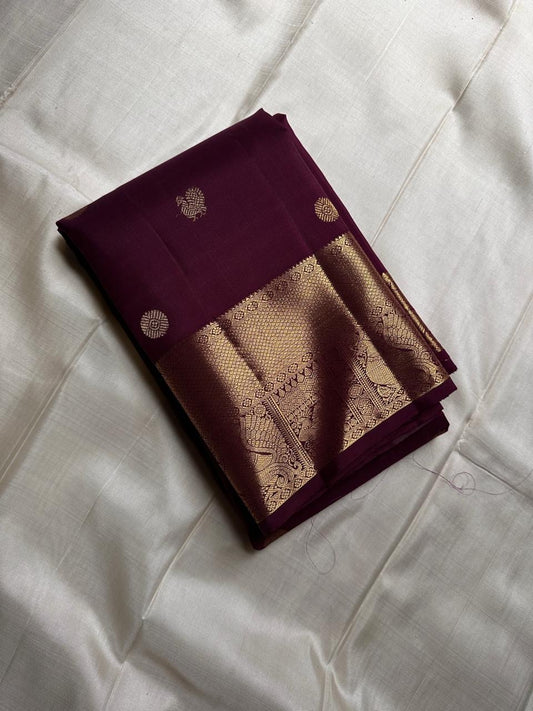 Archana – Handwoven Pure Silk Kanchipuram in Deep Brown with Gold Zari Accents & Ornate layered border