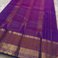 Vaidhehi – Ivory Kanchipuram Silk Saree
A classic ivory silk saree with a shot purple-orange Rudraksham border and a rich Thazhampoo reku pallu—timeless elegance woven with tradition