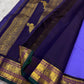 Kili kanchipuram beautiful purple and violet combination adorned with kili and kamalam butta , vanasringaram border and green selvedge with parrots parading   in Pallu
