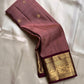 Mauve Buttas – Pure Kanchipuram Silk Saree
Ethereal mauve body adorned with buttas ✨
Borders rich in regal zari with floral and animal artistry 🌿🦚
Grand pallu woven in opulent gold jaal, exuding heritage charm 💫 Silk Mark Certified, delivery in 2 weeks