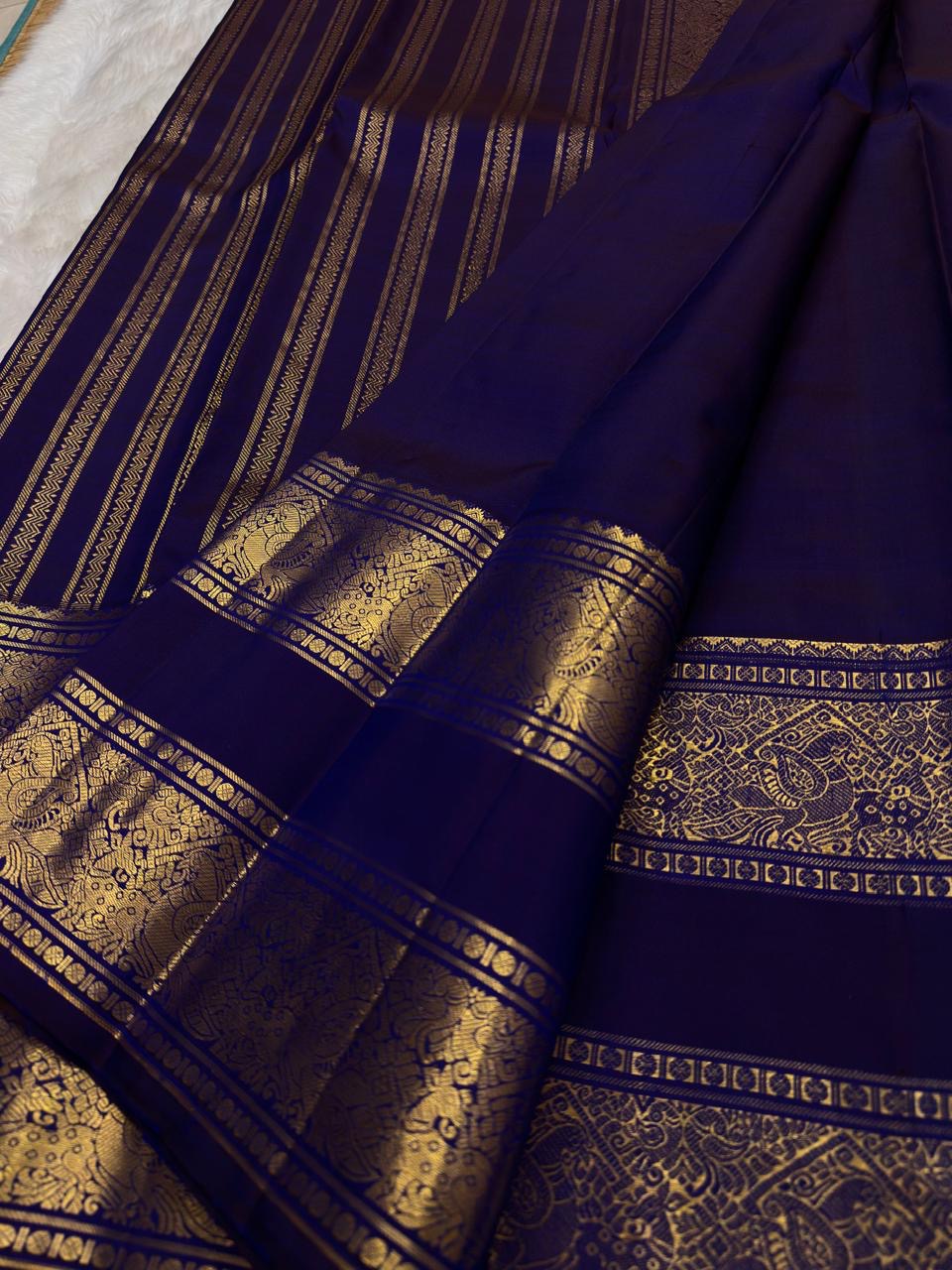 Royal Indigo and Antique Gold Handwoven Pure Silk Kanjeevaram Saree with Rettapet Border and Mayil Chakram Butta