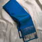 Vibha  peacock blue green shot double color Pure Kanchipuram Silk Saree Blending the Grandeur of South Indian Weaving with Paithani-Inspired Floral Zari Borders and a Lustrous Rose Gold zari Pallu