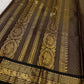 Kohl Swarna — silk mark certified lightweight saree 
Deep kohl brown body with fine pinstripes and gold rosette buttas, framed by antique-gold zari borders and grand paisley brocade pallu• free shipping eithin usa  two weeks
