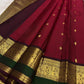 Large-scale vanasringaram gold zari motifs on arakku red Kanjipuram saree border — Idam Living