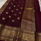 Pachai Butta – Pure Kanchipuram Silk Saree
Emerald silk scattered with radiant buttas.
A wine korvai border rich in gaja artistry.
Floral medallions glow in antique-gold zari.

Silk Mark Certified, delivery in 2 weeks