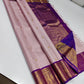 Gilded Blush

 Blush Pink Kanchipuram Pure Silk Saree

All-Over Gold Zari Kattam Weave with Buttas

Royal Purple Border with 2G Zari Peacock Motifs

Grand Purple Brocade Pallu | Contrast Blouse fabric 

 Silk mark certified pure silk , 2G Zari