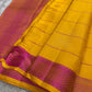 Marigold Pink Silk Thread — Pure Kanchipuram Silk
All-thread weave in marigold yellow with magenta kattam checks & buttas
Pink–orange zari woven pallu • Silk Mark Certified • Free Shipping USA